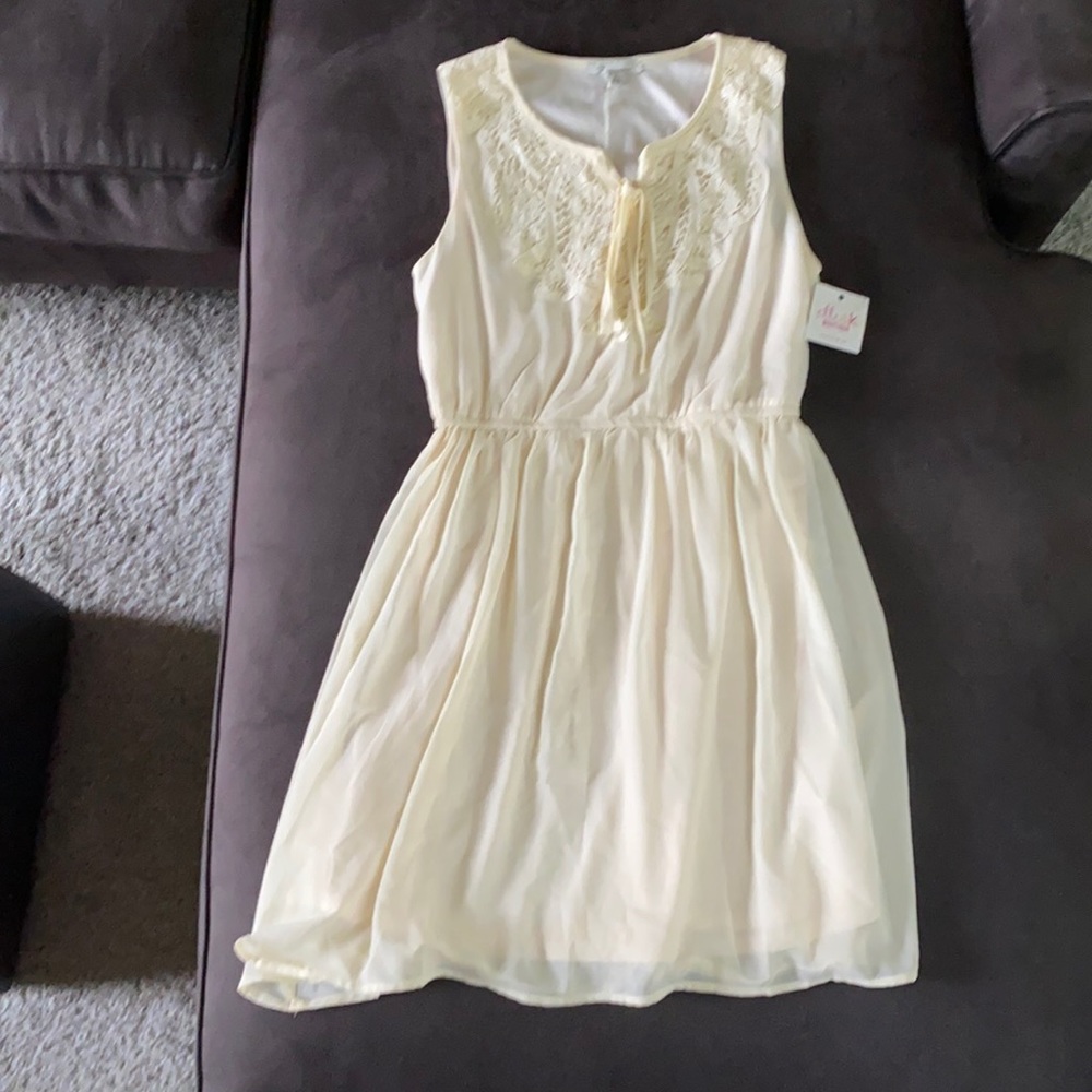 Cream sheer sleeveless dress